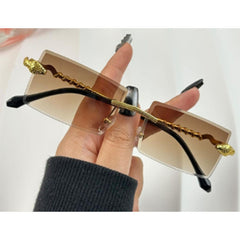 Sonnenbrille mit goldenen Schlangen-Details