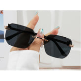 Rechteckige randlose Sonnenbrille