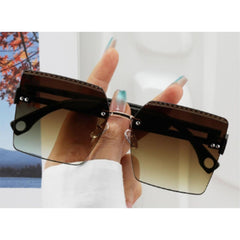 Modische quadratische randlose Sonnenbrille