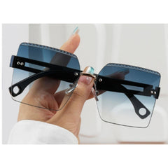 Modische quadratische randlose Sonnenbrille