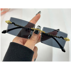 Sonnenbrille mit goldenen Schlangen-Details